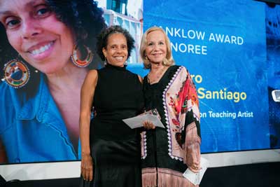 Amparo Chigui Santiago receiving her award from Linda Janklow